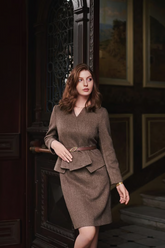 a lady in a brown wool faux two-piece set dress with a belt